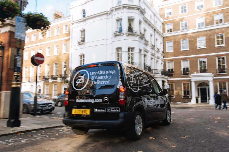 Dry cleaning van in the city